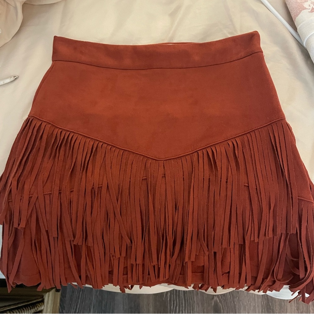 Fringe red/burnt orange skirt. Never worn. Tags taken off